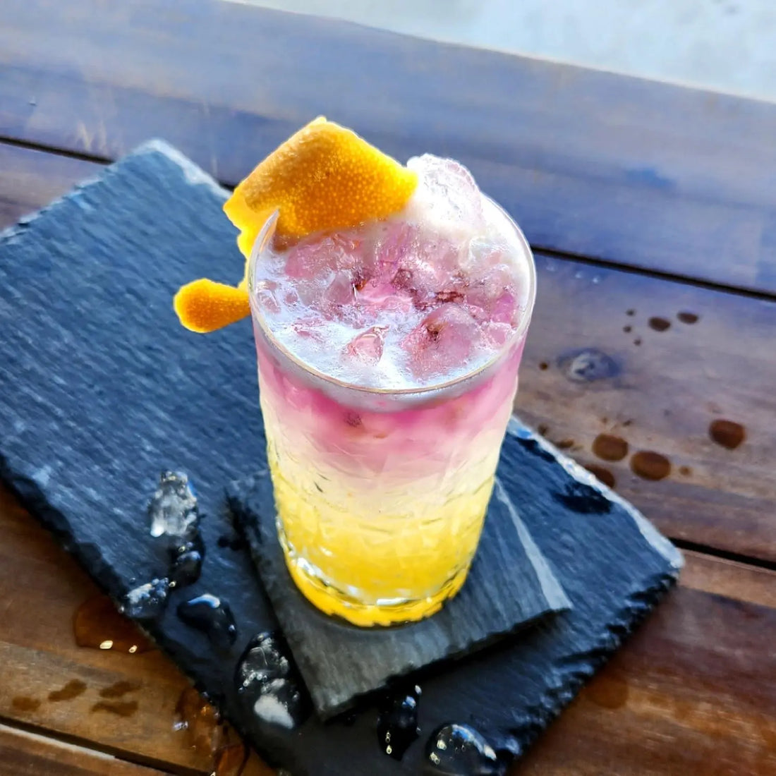 Purple Gin Pineapple and Passionfruit Collins