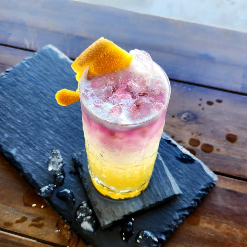 Purple Gin Pineapple and Passionfruit Collins