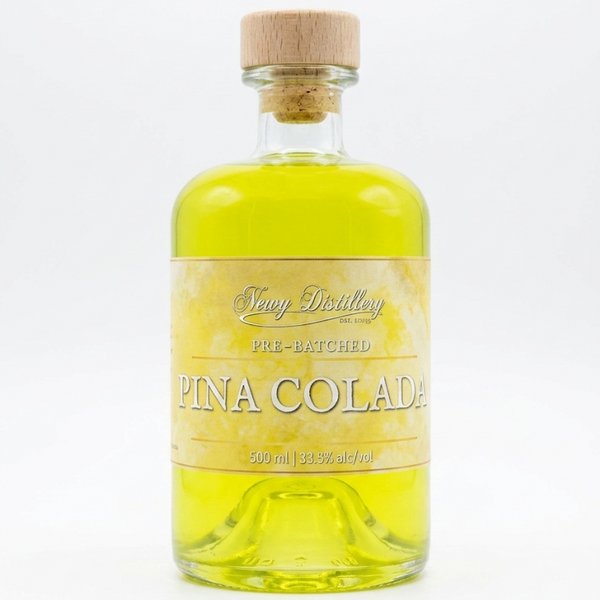 Bottle of Pina Colada liquor with a cork lid on a white background